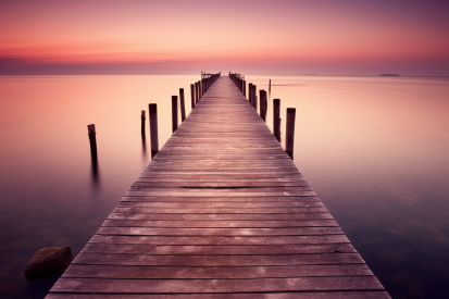 A wooden dock leading to the water