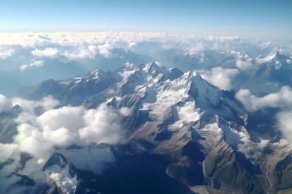 A mountain range with clouds above