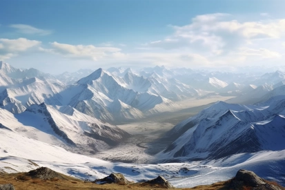 A snowy mountain range with blue sky