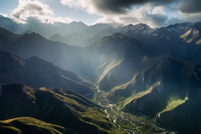 A valley with trees and mountains in the background