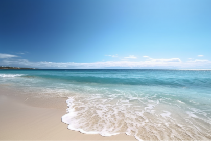 A beach with blue water and blue sky