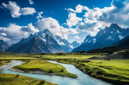 A river running through a valley with mountains in the background