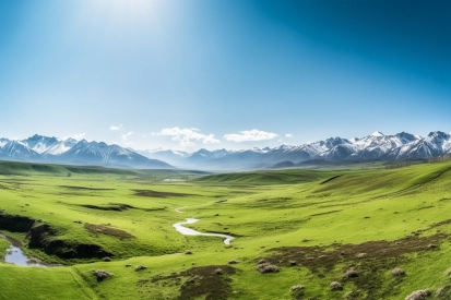 A green field with a river running through it