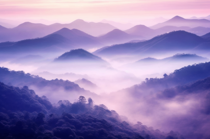 A foggy mountain range with trees